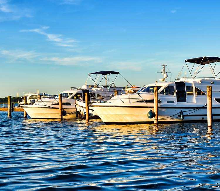 Houseboats moored at jetty.